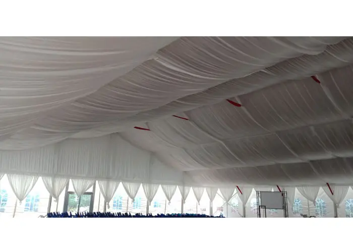 large modular church tent interior accommodating congregation for outdoor worship in the USA