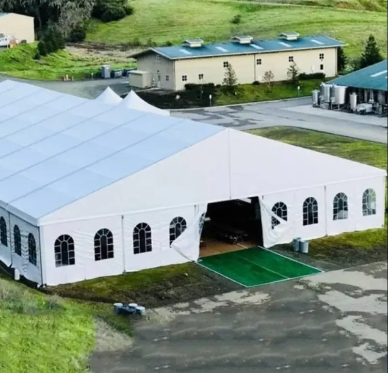 Outdoor church tent setup for revival meeting in rural Nigeria