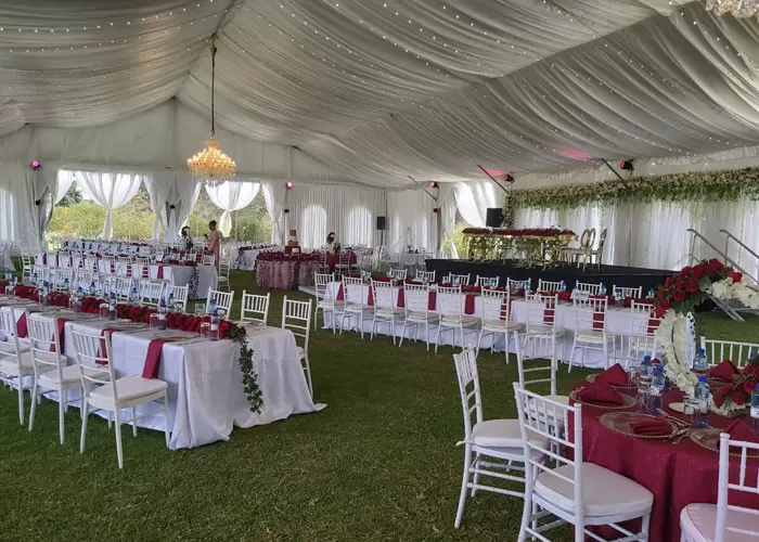 Luxury wedding ceremony inside 30x30m Italian clear span tent

