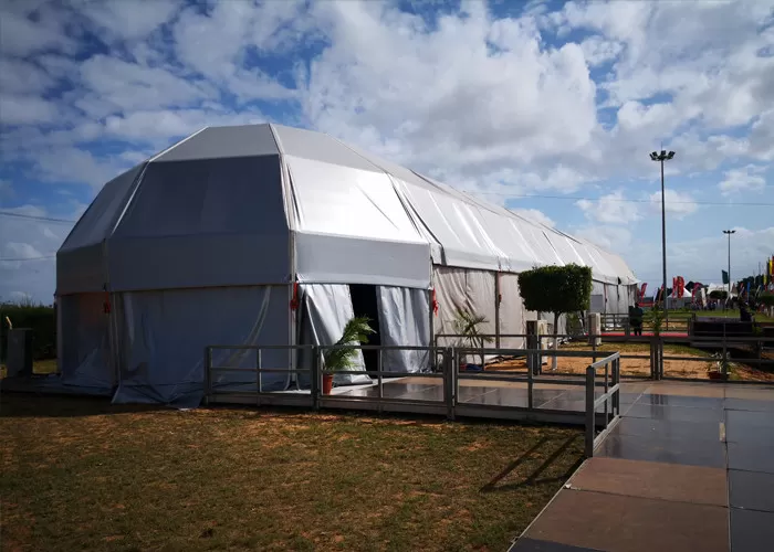 Exterior front view of German business conference tent with branding