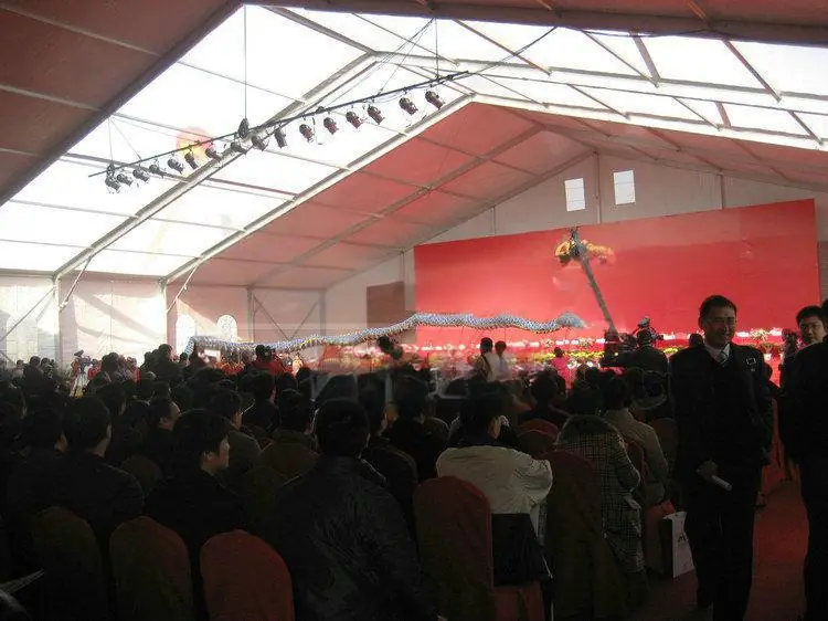 Inside view of 30x45m Canadian corporate forum tent with full seating setup