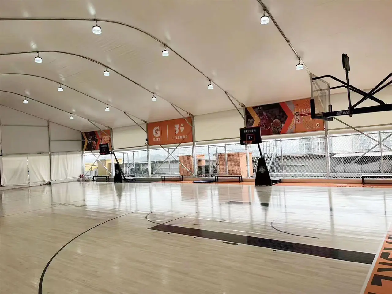 Interior basketball court inside 25x45m Shenzhen sports tent with hoop setup