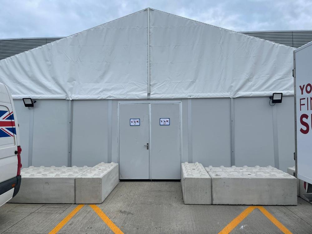 Exterior view of 15x15m UK Workshop Tent in a UK business facility