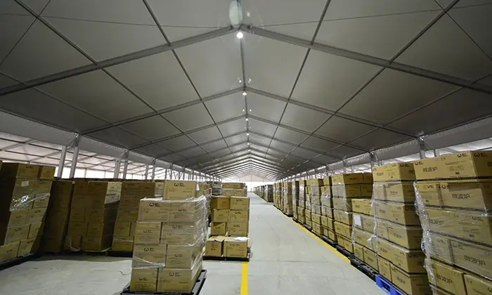 Interior view of AluFrameTech's 20x115m USA Large Storage Tent, displaying its spacious clear-span design for warehousing and logistics.