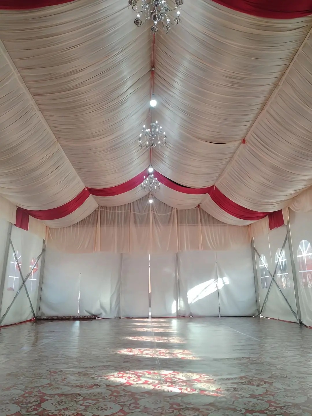 Inside look of large 10x45m wedding tent with high ceiling and modular aluminum frame structure