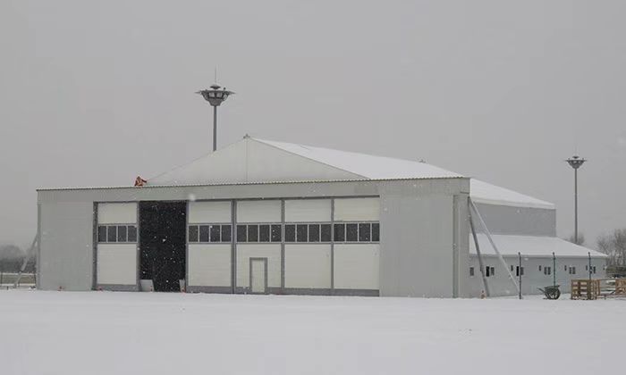 FlexHeliWarehouse 20x25m tent exterior, highlighting modular construction and weather-resistant materials for versatile storage solutions.