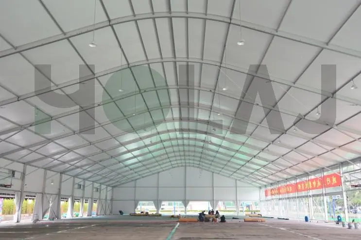 Inside view during modular sports tent installation at humid weather